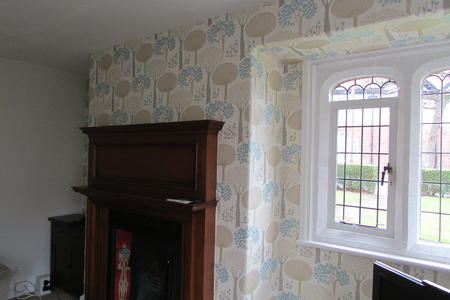 wallpapering sitting room